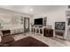 Living room with TV and farmhouse decor at 2206 W Glendale Ave, Phoenix, AZ 85021