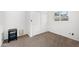 Simple bedroom with carpet flooring and sliding closet doors at 2238 S Estrella Cir, Mesa, AZ 85202