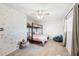 Bedroom with a bunk bed and colorful wall decor at 2238 S Estrella Cir, Mesa, AZ 85202