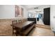 Dining area with a rustic wooden table and bench seating at 2238 S Estrella Cir, Mesa, AZ 85202