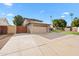 Two-story house with a gated driveway and attached garage at 2238 S Estrella Cir, Mesa, AZ 85202