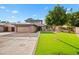 Two-story house with a landscaped lawn and attached garage at 2238 S Estrella Cir, Mesa, AZ 85202