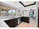 Modern kitchen with stainless steel appliances and white subway tile backsplash at 2238 S Estrella Cir, Mesa, AZ 85202