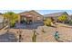 Spacious backyard with gravel landscaping and patio area at 22402 W Harrison St, Buckeye, AZ 85326