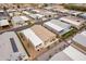 An aerial view showcasing a manufactured home and surrounding neighborhood at 2263 N Trekell Rd, Casa Grande, AZ 85122