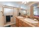 Bathroom with double vanity and walk-in shower at 2263 N Trekell Rd, Casa Grande, AZ 85122