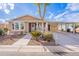 Tan single-story home with carport and landscaped yard at 2263 N Trekell Rd, Casa Grande, AZ 85122