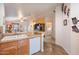 Kitchen with light wood cabinets and granite countertops at 2263 N Trekell Rd # 72, Casa Grande, AZ 85122