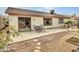 Backyard patio with seating area and view of house at 22667 N 30Th Ave, Phoenix, AZ 85027