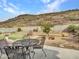 Spacious backyard with patio, putting green, and mountain views at 22667 N 30Th Ave, Phoenix, AZ 85027