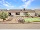 Backyard with putting green, patio, and desert landscaping at 22667 N 30Th Ave, Phoenix, AZ 85027