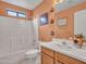 Bathroom with shower/tub combo, vanity, and decor at 22667 N 30Th Ave, Phoenix, AZ 85027