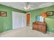 Bedroom with double closet and ceiling fan at 22667 N 30Th Ave, Phoenix, AZ 85027