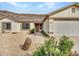 House exterior showcasing a garage and walkway at 22667 N 30Th Ave, Phoenix, AZ 85027