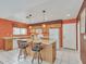 Kitchen with island, wood cabinets, and white appliances at 22667 N 30Th Ave, Phoenix, AZ 85027