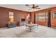 Living room with carpet, neutral walls, and large windows at 22667 N 30Th Ave, Phoenix, AZ 85027