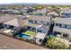 Aerial view of house with pool and landscaped backyard in a residential neighborhood at 23071 N 98Th Dr, Peoria, AZ 85383