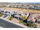 Aerial view of a two-story house and its surrounding neighborhood at 23071 N 98Th Dr, Peoria, AZ 85383