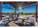 Enjoy outdoor dining under a covered pavilion with picnic tables at 23071 N 98Th Dr, Peoria, AZ 85383