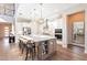 Modern kitchen with white cabinets and large island at 23071 N 98Th Dr, Peoria, AZ 85383