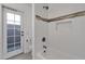 Bathroom with shower/tub combo and modern tile at 23827 N 44Th Ln, Glendale, AZ 85310