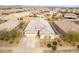 Stunning aerial view of a single-Gathering home boasting a well-manicured front yard and a neutral color palette at 23933 N 167Th Ln, Surprise, AZ 85387