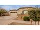 Beautiful single story home with stone accents and a three-car garage at 23933 N 167Th Ln, Surprise, AZ 85387