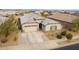 Aerial view of single story home featuring a tile roof, neutral exterior paint, and a well manicured lawn at 23933 N 167Th Ln, Surprise, AZ 85387