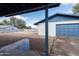 Gravel backyard with detached garage and covered patio at 2446 E Marilyn Rd, Phoenix, AZ 85032