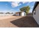 Large backyard with gravel landscaping and detached garage at 2446 E Marilyn Rd, Phoenix, AZ 85032