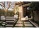 Inviting outdoor patio featuring modern furniture, lush greenery, and a stylish pergola for shaded relaxation at 27545 N 97Th Pl, Scottsdale, AZ 85262