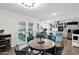 Inviting dining area with views to backyard patio and open kitchen at 2912 E Clarendon Ave, Phoenix, AZ 85016