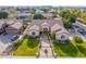 Expansive aerial view showcasing the property's beautiful landscaping, tile roof, and peaceful neighborhood at 2939 E Huber St, Mesa, AZ 85213