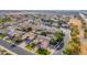 Overhead shot of a neighborhood with pools, landscaped yards, and well-kept residences at 2939 E Huber St, Mesa, AZ 85213