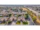 Picturesque aerial perspective of houses near a canal, showing tidy lawns and community layout at 2939 E Huber St, Mesa, AZ 85213