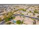 Aerial view of homes near a canal, displaying neatly landscaped properties and community features at 2939 E Huber St, Mesa, AZ 85213