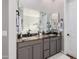 Bathroom featuring double sink vanity and ample mirror space at 2939 E Huber St, Mesa, AZ 85213