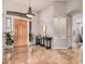 Spacious foyer showcasing tile flooring, chandelier, and natural light at 2939 E Huber St, Mesa, AZ 85213