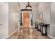 Elegant foyer featuring marble floors, console table, and high ceilings at 2939 E Huber St, Mesa, AZ 85213