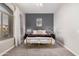 Relaxing primary bedroom featuring a large bed and window at 2939 E Huber St, Mesa, AZ 85213