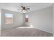 Bedroom with ceiling fan and window at 2942 S Sierra Hts, Mesa, AZ 85212