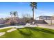 Beautiful pool and waterfall feature in a sunny backyard at 2942 S Sierra Hts, Mesa, AZ 85212