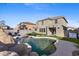 Stunning pool and spa with artificial turf and lounge chairs at 2942 S Sierra Hts, Mesa, AZ 85212