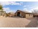 Large backyard with gravel and space for entertaining at 29590 N Balmoral Pl, San Tan Valley, AZ 85143