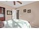 Bedroom with built-in shelving and ceiling fan at 29590 N Balmoral Pl, San Tan Valley, AZ 85143