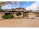 Two-story house with a two-car garage and drought-tolerant landscaping at 29590 N Balmoral Pl, San Tan Valley, AZ 85143