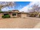 House exterior showcasing a two-car garage and gravel driveway at 29590 N Balmoral Pl, San Tan Valley, AZ 85143