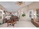 Comfortable living room with ample natural light and a view of kitchen at 29590 N Balmoral Pl, San Tan Valley, AZ 85143