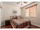 Cozy bedroom with a full-size bed and hardwood floors at 30130 N Jillian Dr, San Tan Valley, AZ 85143