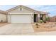 One-story house with a two-car garage and desert landscaping at 30130 N Jillian Dr, San Tan Valley, AZ 85143